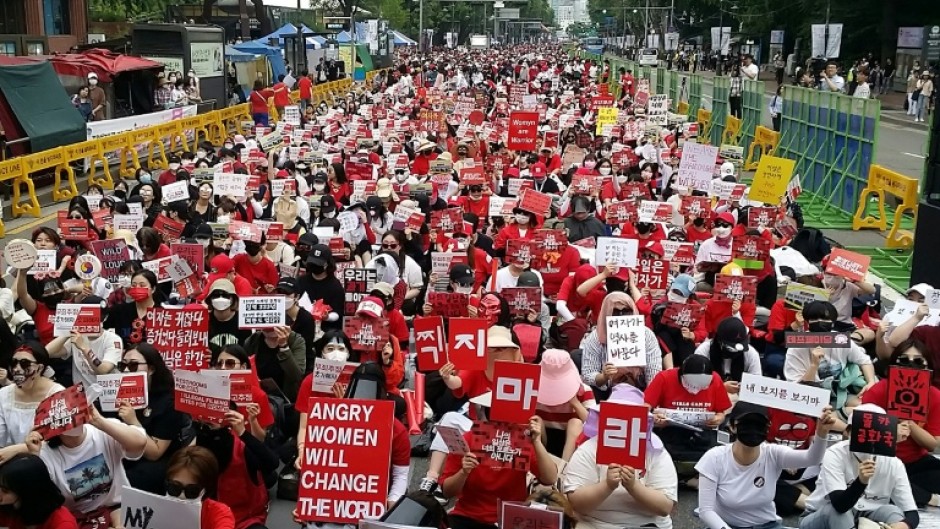 South Korean women protesting against spycam pornography in Seoul in 2018. Massive women's rights protests in the country have led to victories on issues ranging from abortion access to tougher penalties for spycam crimes