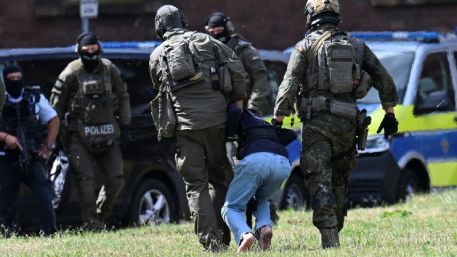 Officials said after the attack that two men and a woman were killed by being stabbed in the neck