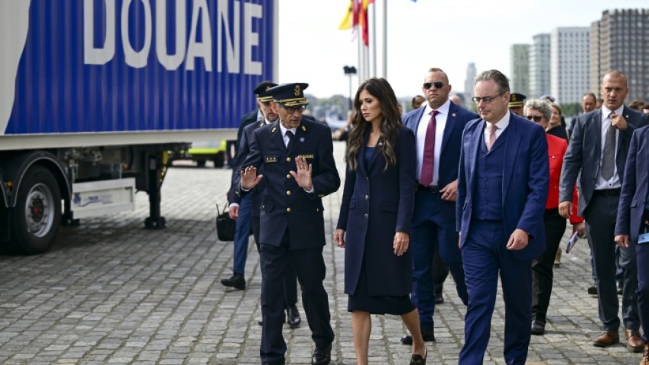 Belgian Prime Minister Bart De Wever, right, at the port of Antwerp with US Homeland Security Secretary Kristi Noem