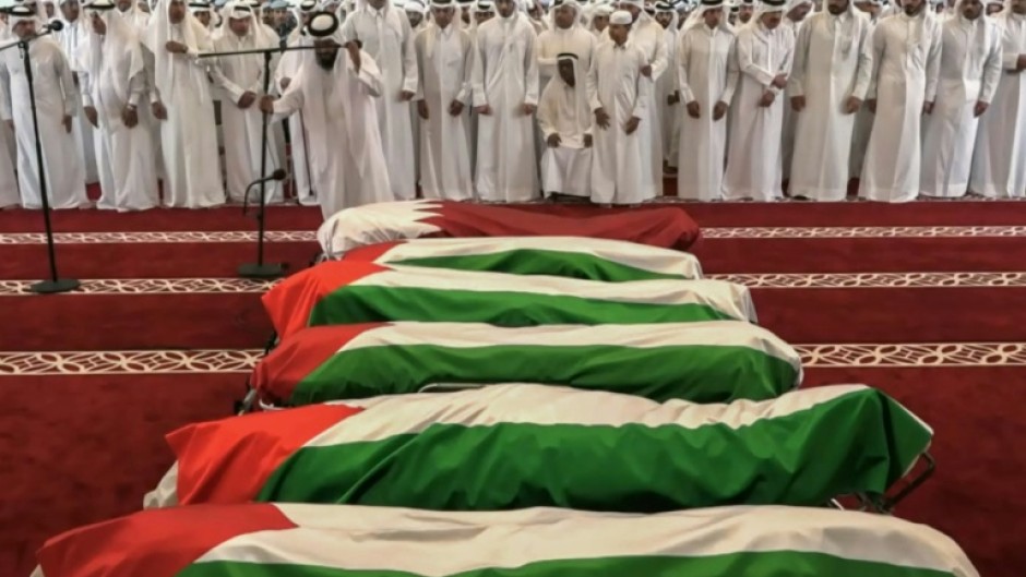 Qatar's emir joins mourners at the funeral of five Hamas members and a Qatari security man killed in Tuesday's attack by Israel on the Hamas compound in Doha, in this grab from Qatar TV footage.