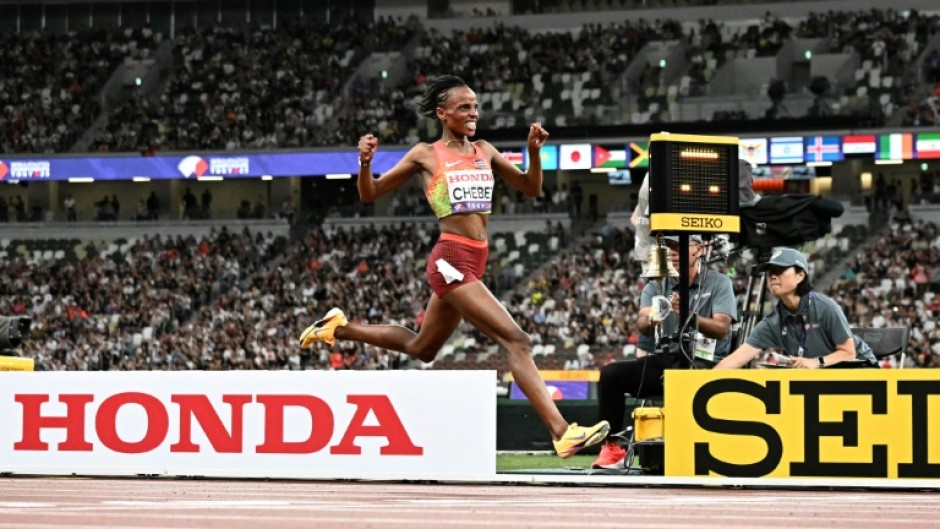 Kenya's Beatrice Chebet celebrates after winning the world 10,000m title