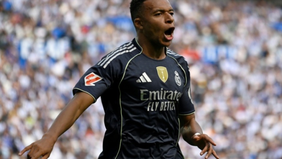 Real Madrid's French forward Kylian Mbappe celebrates scoring his team's first goal against Real Sociedad