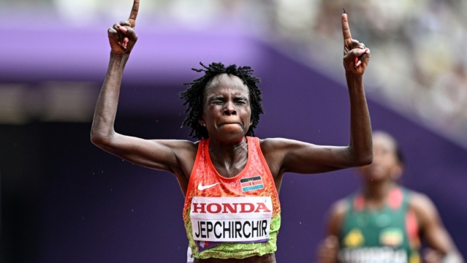 Kenya's Peres Jepchirchir celebrates winning the women's marathon at the world championships in Tokyo