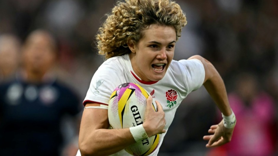 Ellie Kildunne scores England's fourth try in their 69-7 World Cup Pool A win over the United States