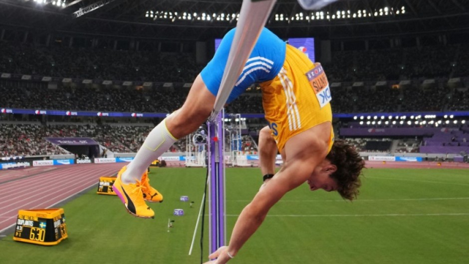 Armand Duplantis clears the bar on the way to a 14th world pole vault record