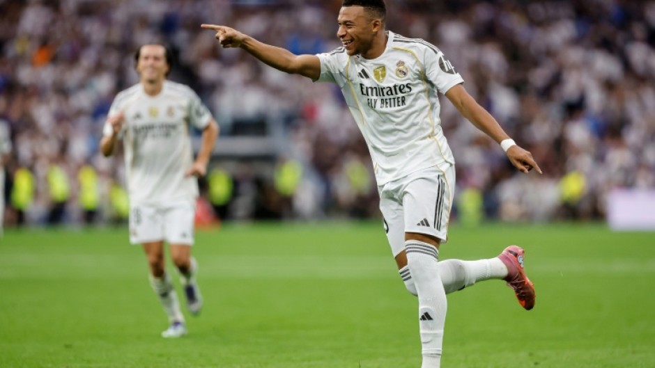 Real Madrid's French forward Kylian Mbappe celebrates after scoring their second goal against Espanyol on Saturday