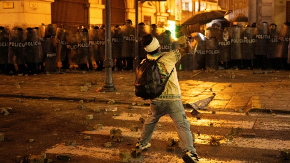 The clashes broke out as demonstrators tried to approach executive and congressional buildings in Lima