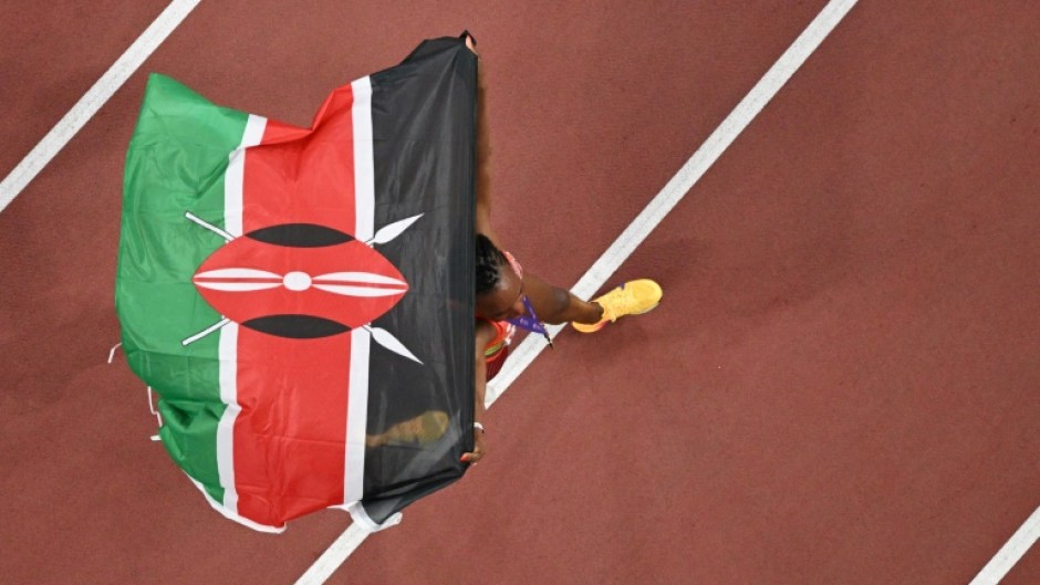 Kenya's double gold medallist Beatrice Chebet celebrates at the world championships in Tokyo -- she has never failed an anti-doping test but questions are being asked about her country's practices