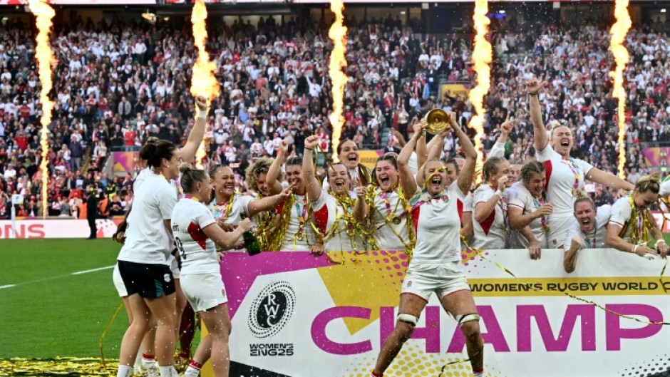 England captain Zoe Aldcroft lifts the Women’s Rugby World Cup trophy after a 33-13 win over Canada in the final at Twickenham