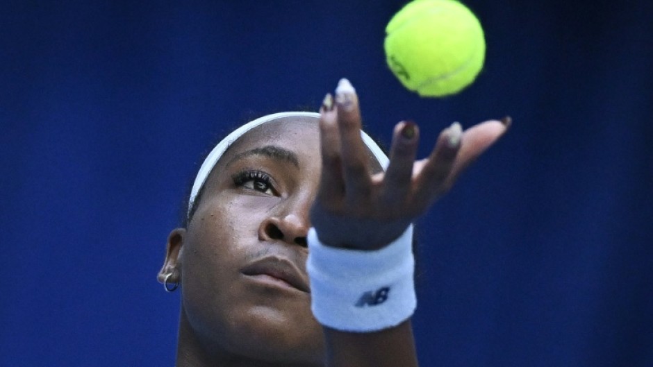 Coco Gauff serves against Leylah Fernandez in Beijing