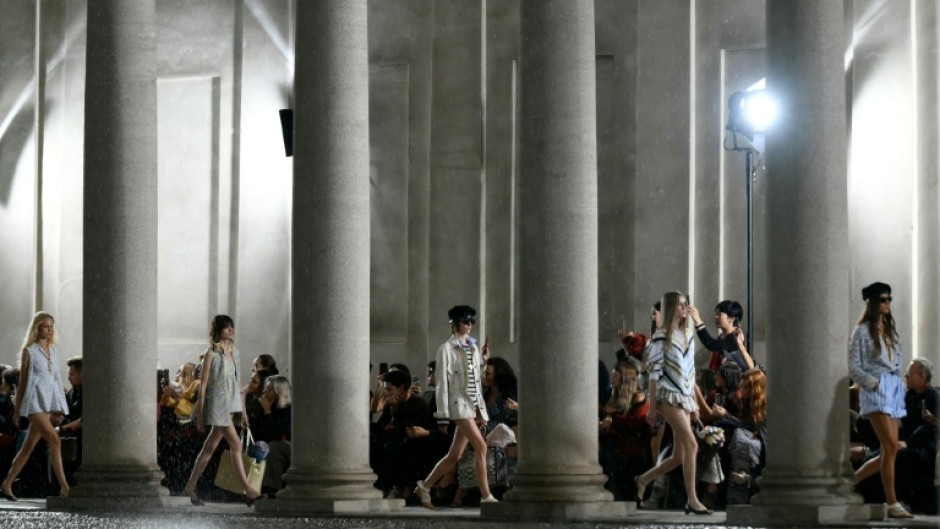 many models wore just swim briefs, shorts were rolled up and mini dresses became open-backed t-shirts.