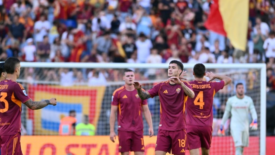 Matias Soule celebrates scoring Roma's second goal against Verona on Sunday