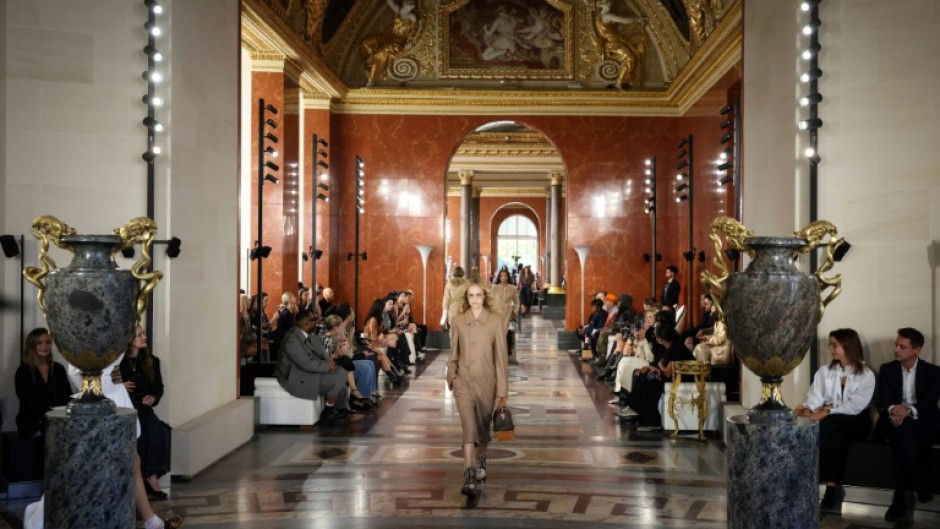 A model presents a creation by Louis Vuitton at Paris Fashion Week