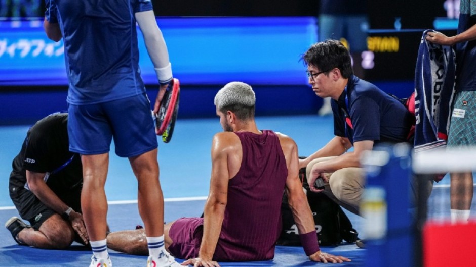 Carlos Alcaraz gets medical attention in Tokyo