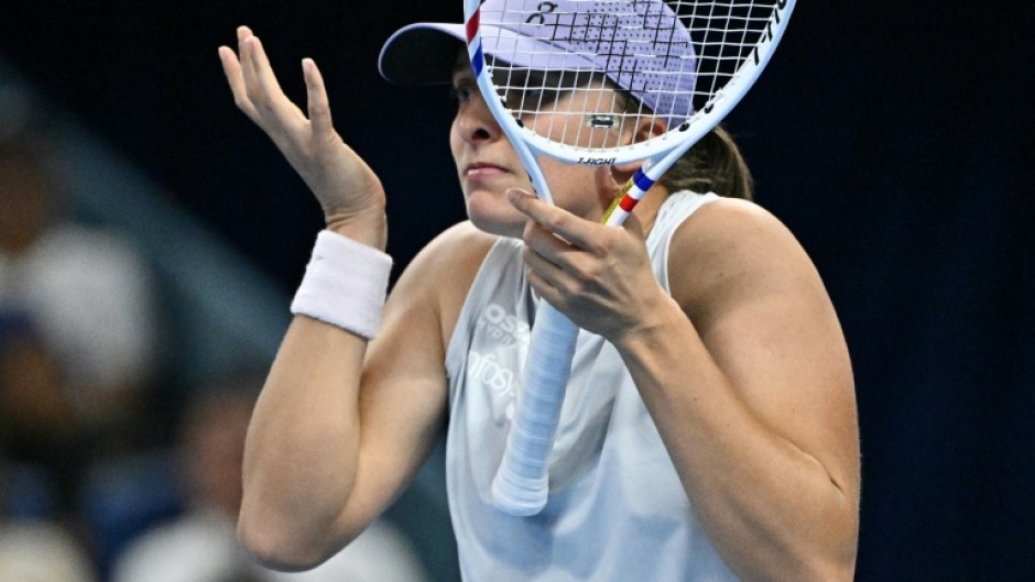 Iga Swiatek reacts during her match against USA’s Emma Navarro