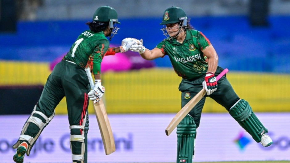 Bangladesh's Rubya Haider (R) and Nigar Sultana en route to leading their side to a comfortable opening win