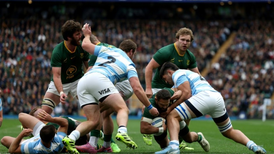 South Africa's scrum-half Cobus Reinach dives to score his team's third try during their 29-27 victory over Argentina