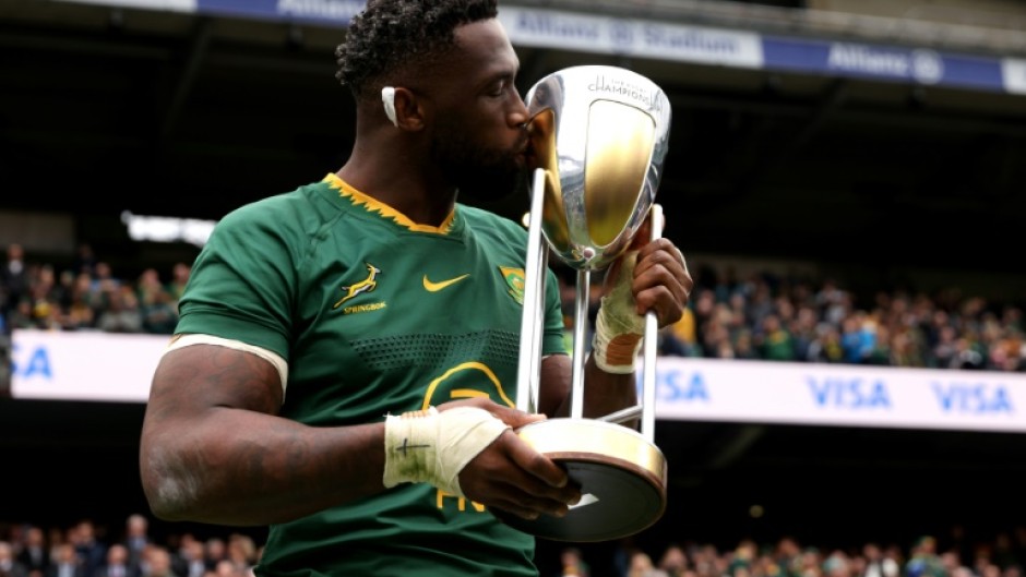 South Africa captain Siya Kolisi kisses the Rugby Championship trophy following a 29-27 win over Argentina at Twickenham that clinched the title