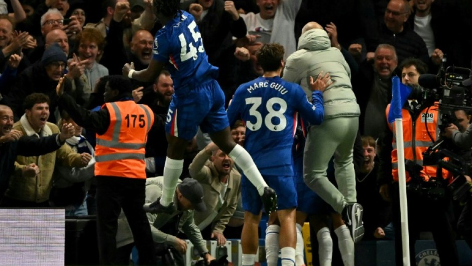Chelsea boss Enzo Maresca (R) embarked on a jubilant sprint down the touchline to celebrate with his players, earning a red card in the process