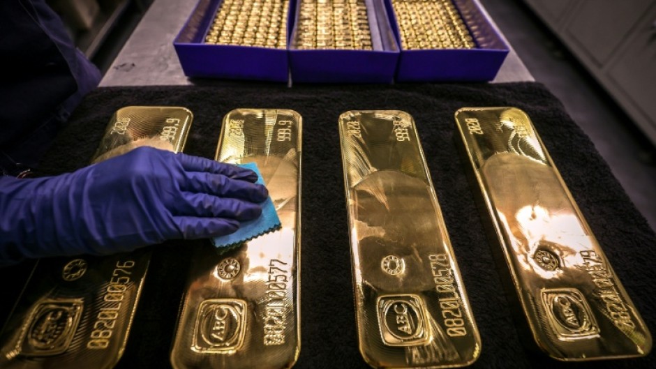 Gold prices have hit a record high and are just short of the $4,000 mark