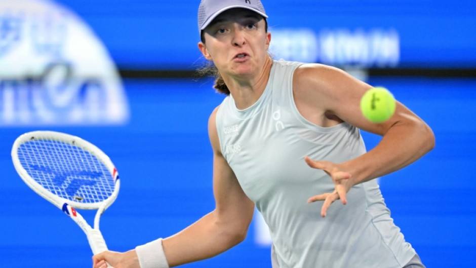 Poland's Iga Swiatek eased past the Czech Republic's Marie Bouzkova during the Wuhan Open tennis tournament