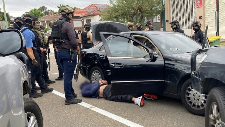 New South Wales police swooped in on two cars after learning the men were preparing to carry out the alleged killing in Revesby, a suburb in the city's southwest