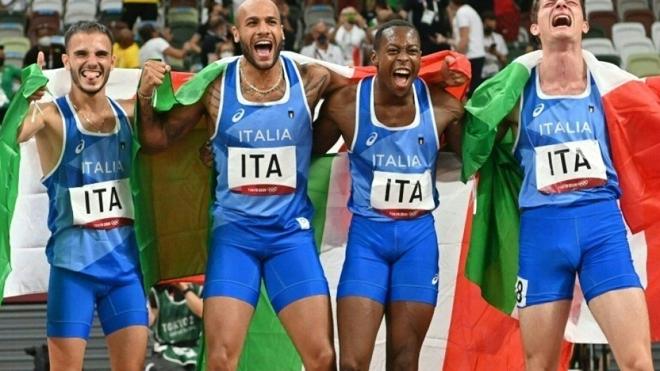 Italy's relay team Lorenzo Patta, Marcell Jacobs, Eseosa Desalu and Filippo Tortu after their 4x100m gold at the Tokyo Olympics