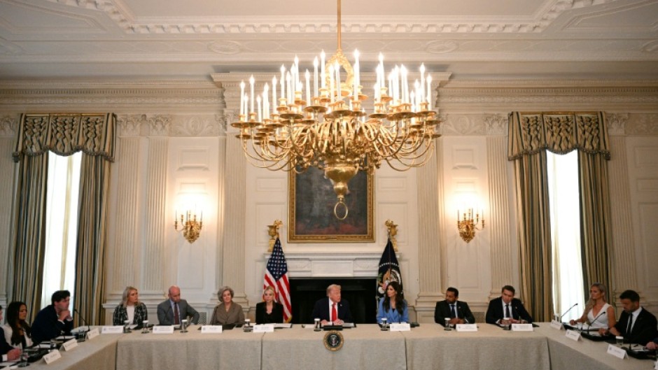 US President Donald Trump (C) had been chairing a roundtable about Antifa in the State Dining Room of the White House