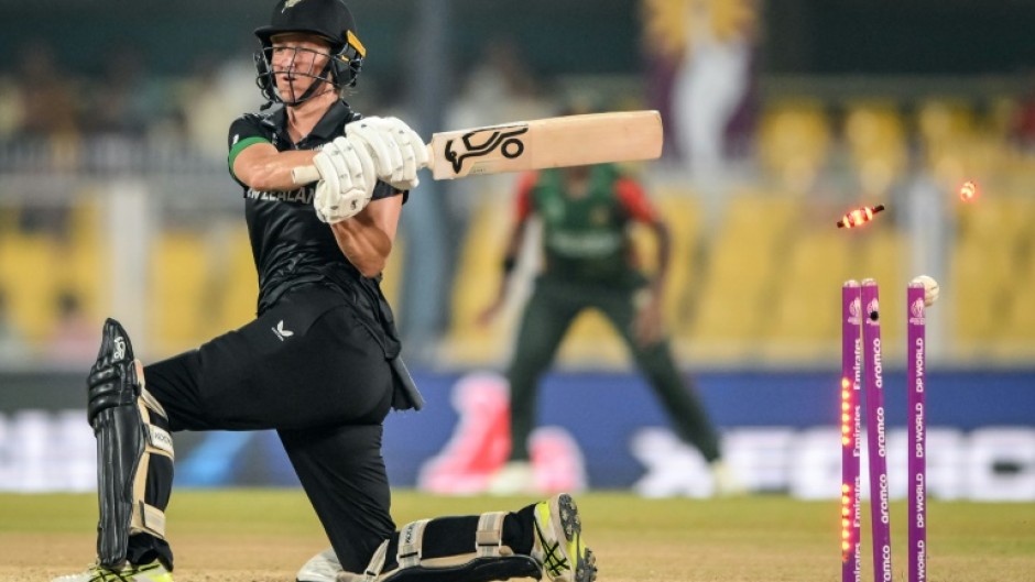 New Zealand captain Sophie Devine struck 63 as her team collected their first win at the Women's World Cup when they beat Bangladesh by 100 runs in Guwahati