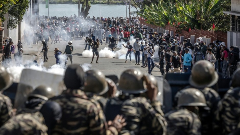Protesters clash with members of the Malagasy gendarmerie as thousands gather during protests calling for the resignation of President Rajoelina in Antananarivo, on October 11, 2025