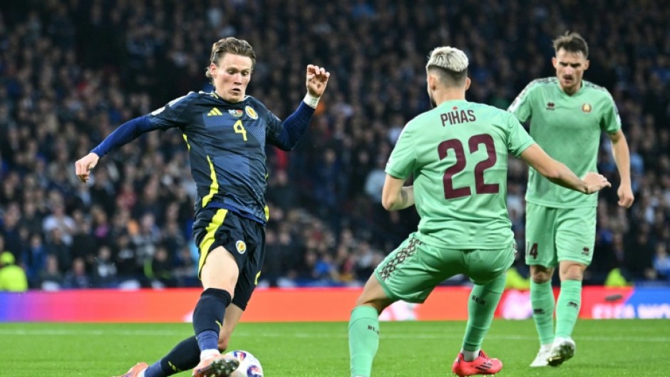 Scott McTominay (L) sealed an important victory for Scotland as he lashed home with his left foot on 84 minutes