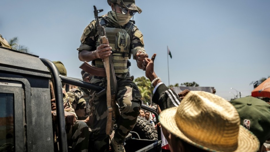 Joyful people flooded the square in the Madagascar capital ahead of an address by the president who has faced weeks of angry protests