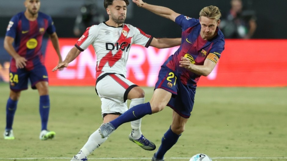 Barcelona's Dutch midfielder Frenkie de Jong signed a new contract with the club on Wednesday stretching until 2029
