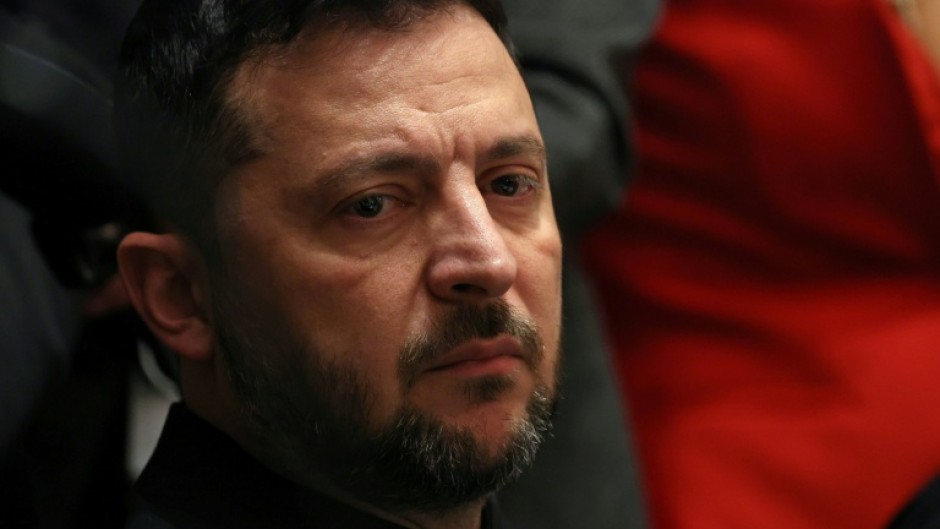 Ukrainian President Volodymyr Zelensky meets with unseen US President Donald Trump at the White House