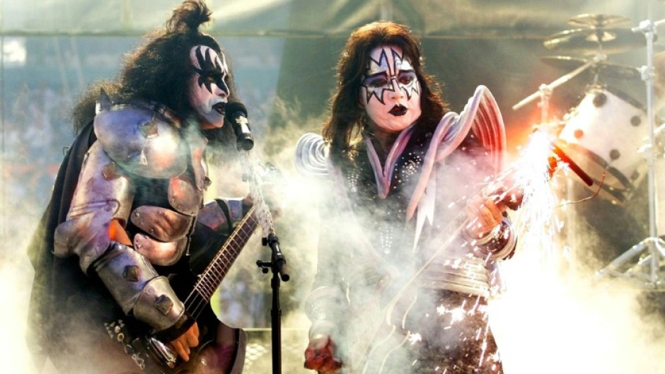 Gene Simmons (L) and Ace Frehley (R) were two of the original members of glam rock band KISS