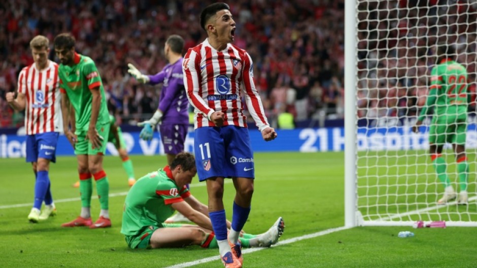 Thiago Almada (C) netted his first goal for the club after 69 minutes to break Osasuna's resistence and decide the game