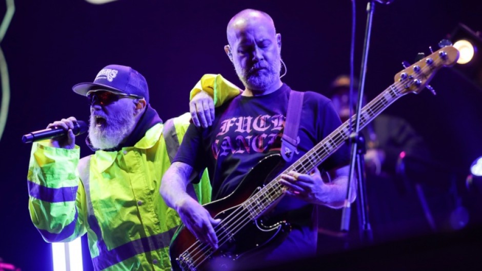 Fred Durst (L) and Sam Rivers from the US band "Limp Bizkit" perform in Bogota on March 21, 2024