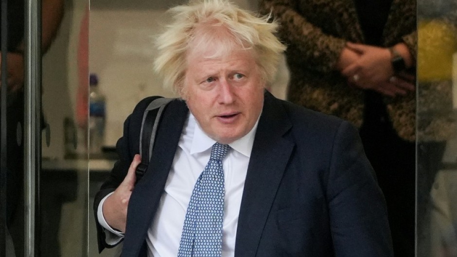 Britain's former prime minister Boris Johnson leaves the UK Covid-19 inquiry, in west London after giving evidence