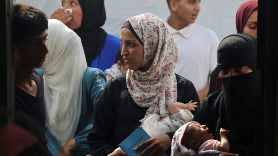 At current rates, it would take a decade to evacuate 15,000 people, including 4,000 children, said Rik Peeperkorn