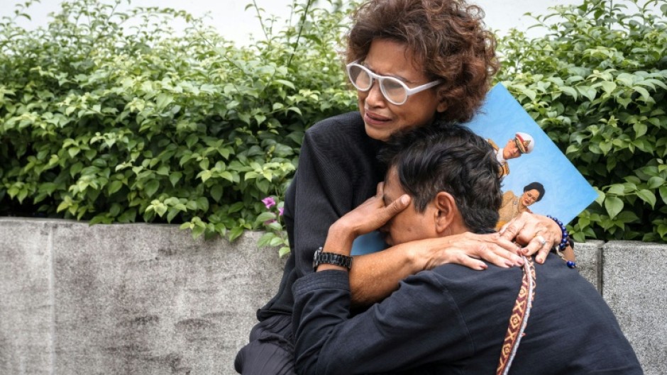 Mourners gathered outside a hospital in Bangkok after the death of former Queen Sirikit, aged 93, was announced. The royal familiy is revered in Thailand