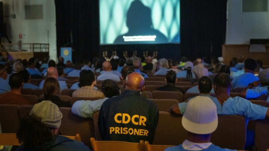 Inmates and guests watch a screening during the San Quentin Film Festival at the infamous California prison