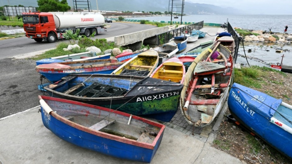 Fishing boats are tied together ahead of Hurricane Melissa's arrival in the village of Rae Town, East Kingston, Jamaica, on October 25, 2025