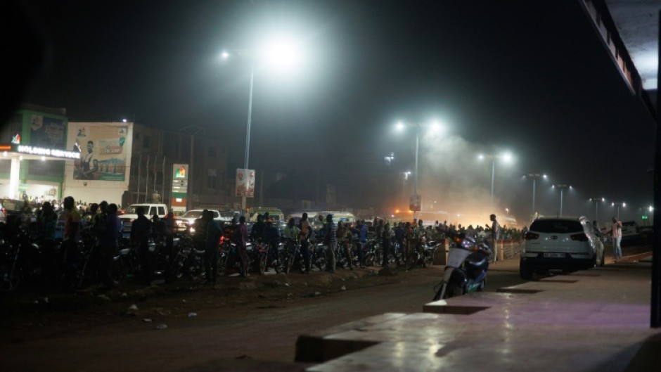 Vehicles queue for petrol at a service station in Bamako on October 27, 2025