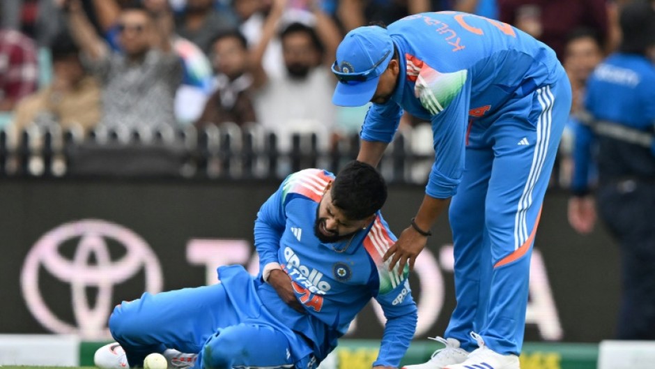 India’s Shreyas Iyer (L) lacerated his spleen taking a catch against Australia