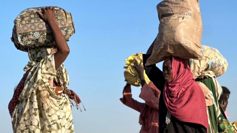 Displaced Sudanese who fled El-Fasher after the city fell to the Rapid Support Forces arrive in the town of Tawila earlier this week