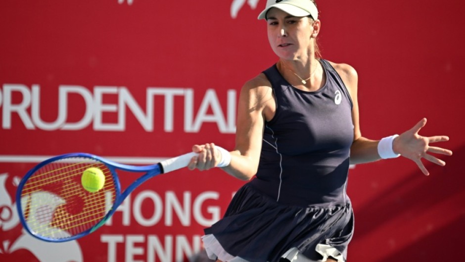 Belinda Bencic hits a return to China's Wang Yafan in Hong Kong