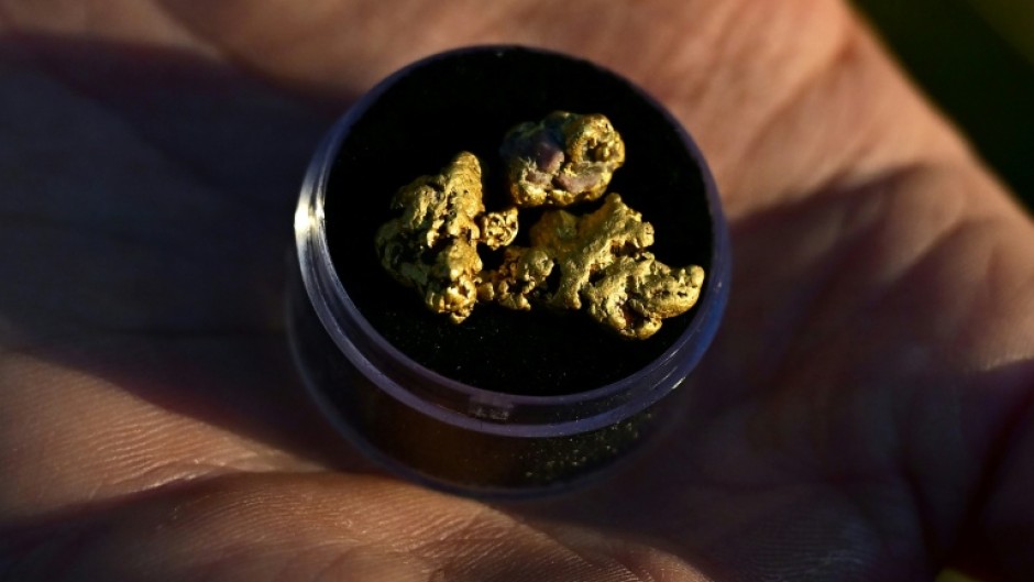 YouTuber Matt James -- who runs the Mountaineer Matt channel -- displays gold he has found in California's El Dorado County, north of Sacramento