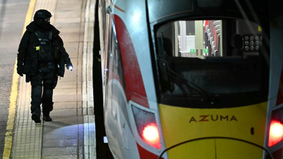 Police were Sunday investigating the train stabbing which left nine people critically injured, and two suspects under arrest