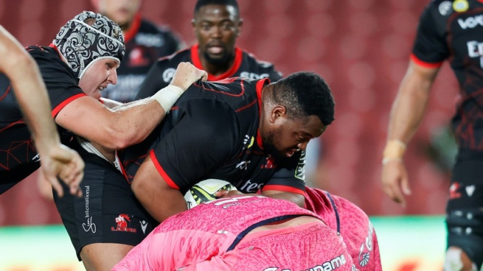 Asenathi Ntlabakanye in action for the Lions in the Challenge Cup in 2022