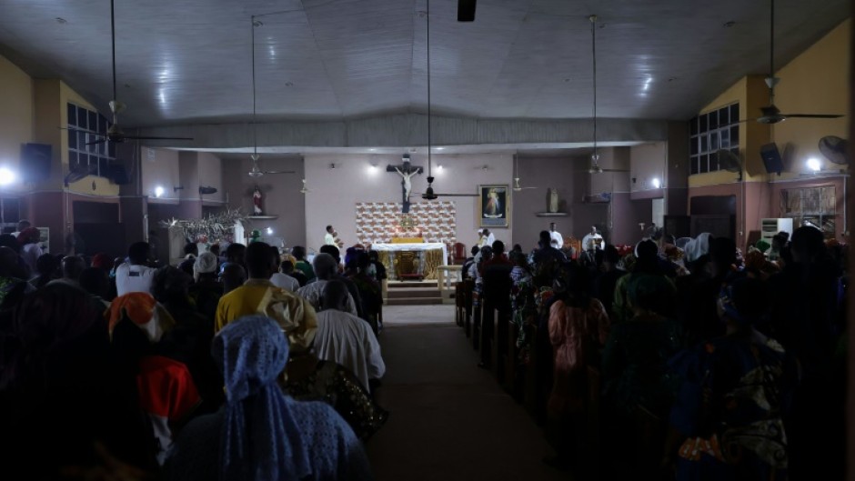 Christians gather a service at Most Pure heart of Mary Catholic church in Ijebu Imushin, Nigeria, in December 2023